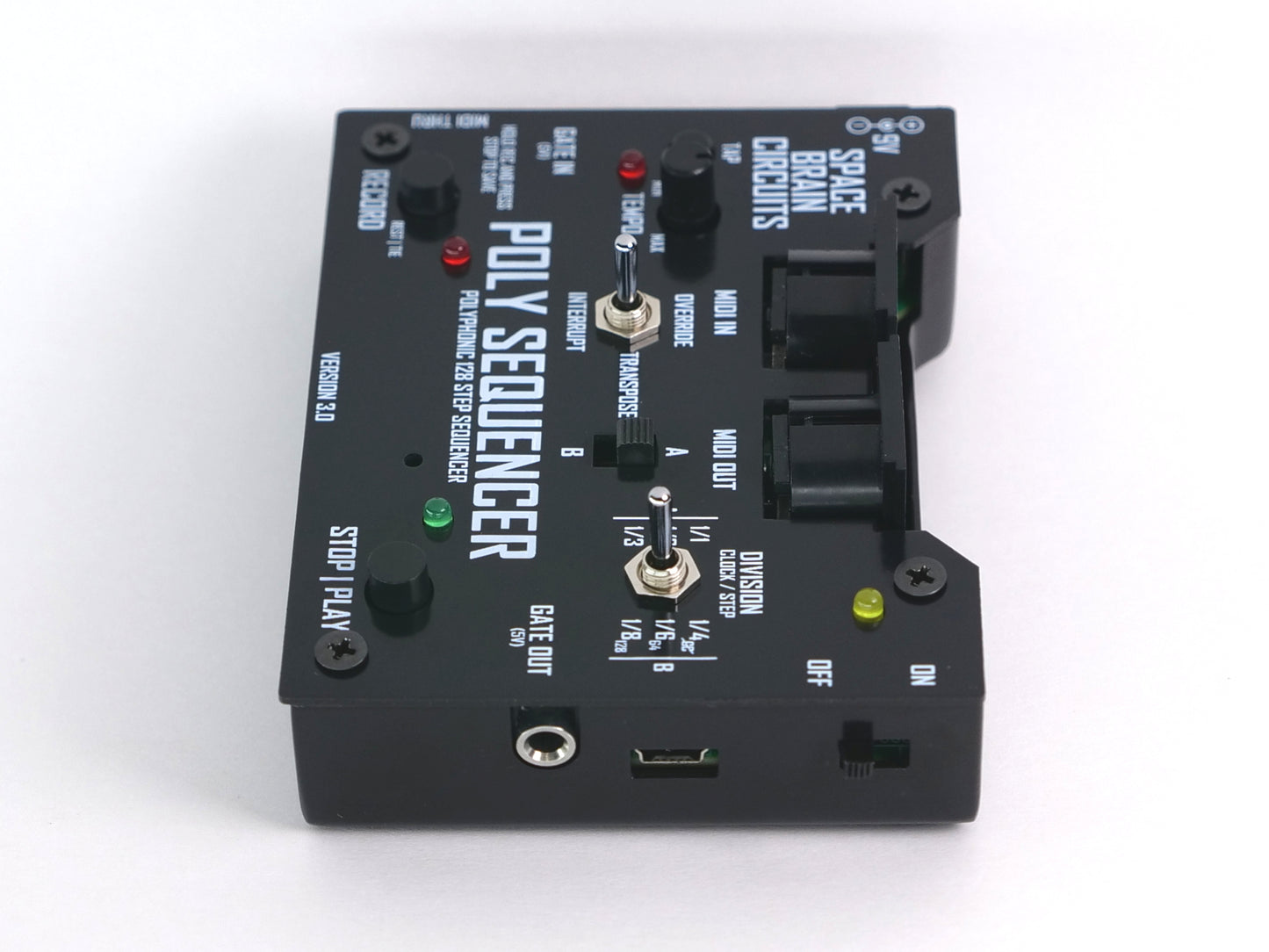 A black electronic signal processor module labeled 'POLY SEQUENCER' with a rotary knob, switches, and ports, photographed on a white background.