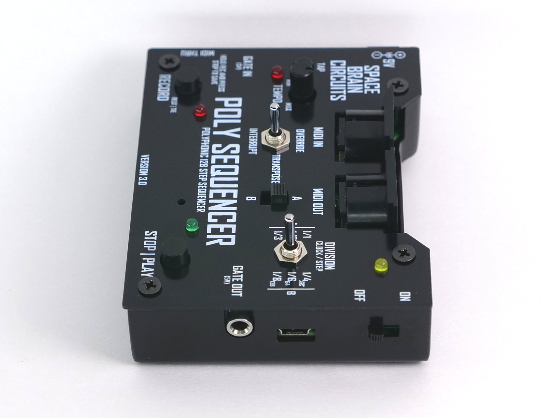 A black electronic signal processor module labeled 'POLY SEQUENCER' with a rotary knob, switches, and ports, photographed on a white background.