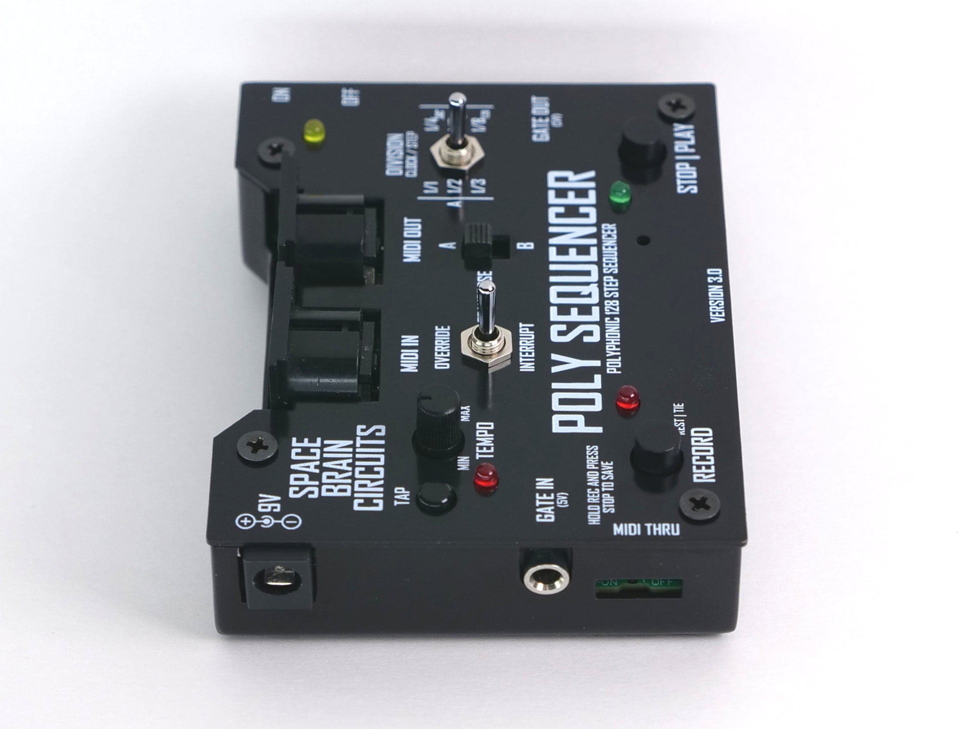 A black Poly Sequencer audio device with white text and various control knobs, switches, and jacks, photographed on a clean white background.